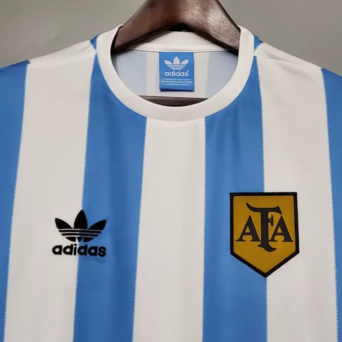 Close-up of a vintage football shirt with embroidery and collar details